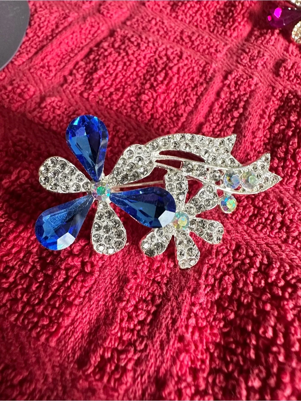Source Unknown Blue and Clear Crystal Floral Brooch